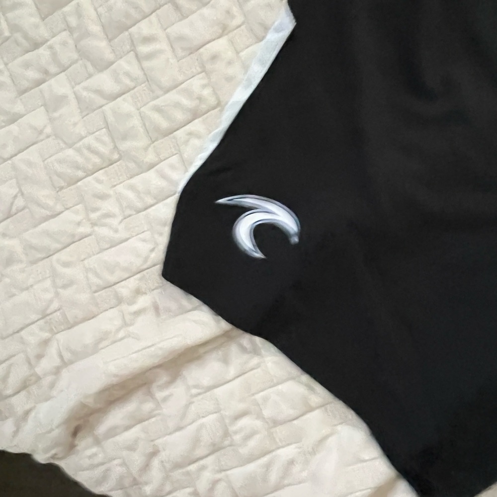 Nike long shorts. From alex Morgan soccer player surf team.